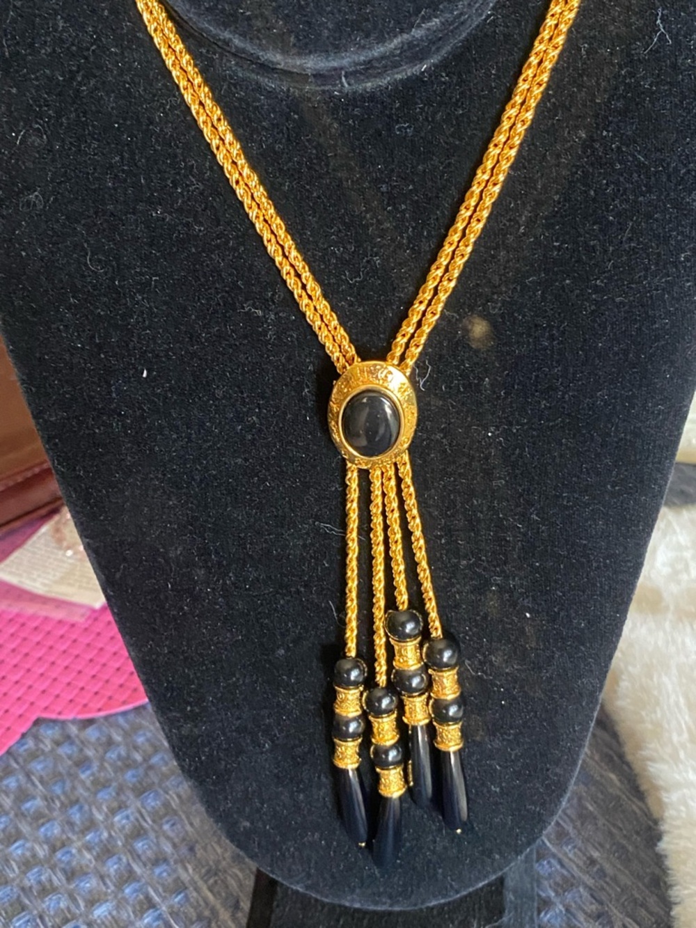 Gold-Tone Necklace with Black Cabochon and Tassel Drops
